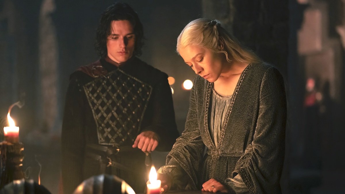 Jace watches his mother Rhaenyra look through old books by candlelight on House of the Dragon