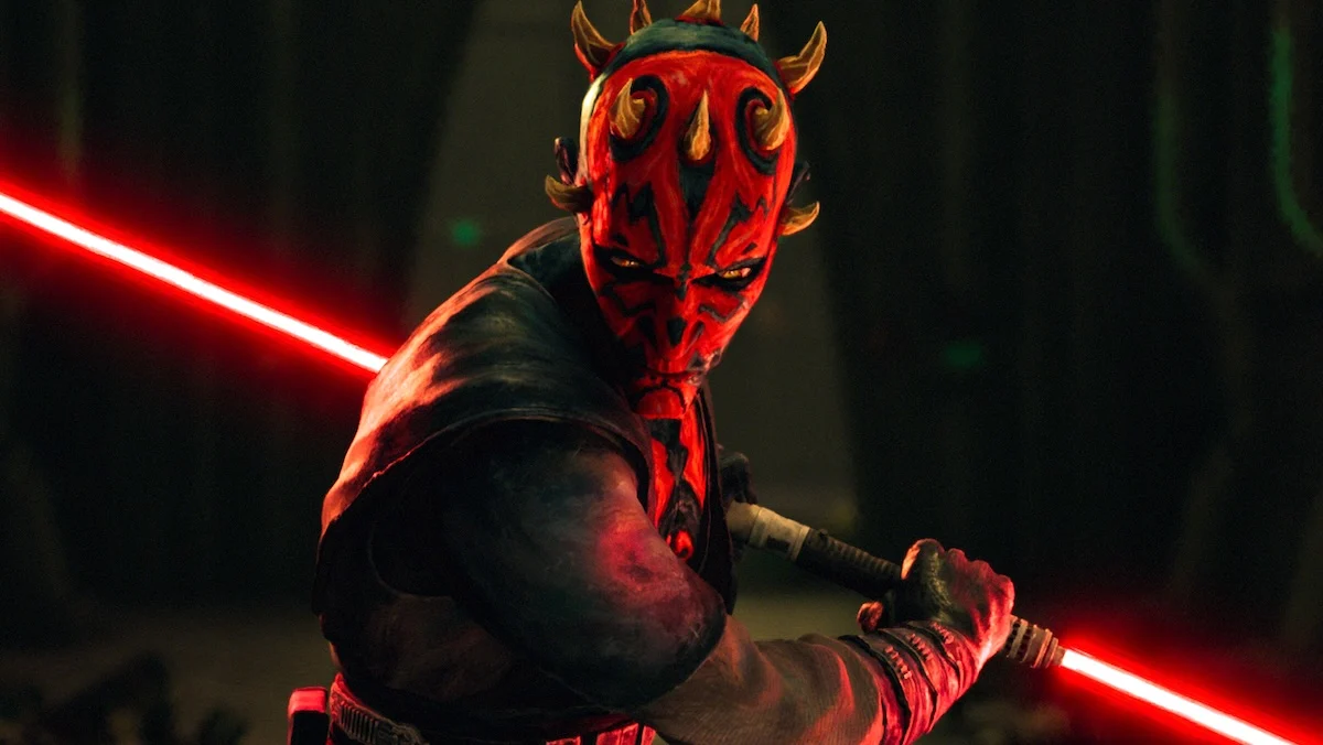Darth Maul drawing his turned on red lightsaber to fight on Maul: Shadow Lord