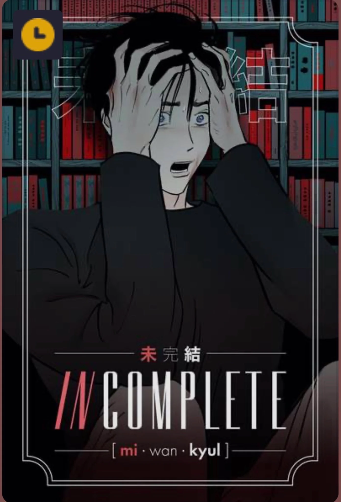 A man grips his head with his hands. he is wearing a long-sleeved black shirt.